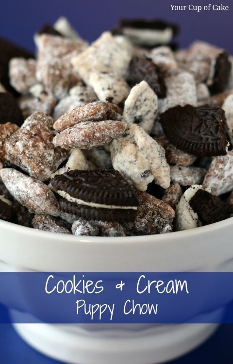 cookies and cream puppy chow is in a white bowl on a blue background with the words cookies and cream puppy chow