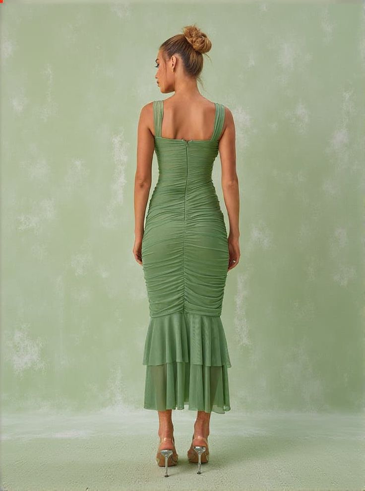 Eri Ruched Mesh Maxi Dress In Green The Eri Ruched Mesh Maxi Dress in a stunning green shade offers an elegant blend of sophistication and comfort. Its flowing maxi silhouette, adorned with delicate ruching and intricate mesh detailing, ensures you stand out at any event. Key Features Material: 100% Polyester for durability and easy care Closure Type: Invisible zipper opening at the back for a seamless look Fit: Designed to fit true to size with a non-stretch fabric ensuring your shape is perfec Summer Green Maxi Dress With Ruched Bodice, Green Maxi Dress With Ruched Bodice For Summer, Green Ruched Evening Maxi Dress, Green Maxi Dress With Pleated Fitted Bodice, Elegant Ruched Maxi Dress For Garden Party, Green Maxi Dress With Ruched Bodice, Spring Green Maxi Dress With Ruched Bodice, Green Maxi Dress With Ruched Fitted Bodice, Green Ruched Dress With Fitted Bodice