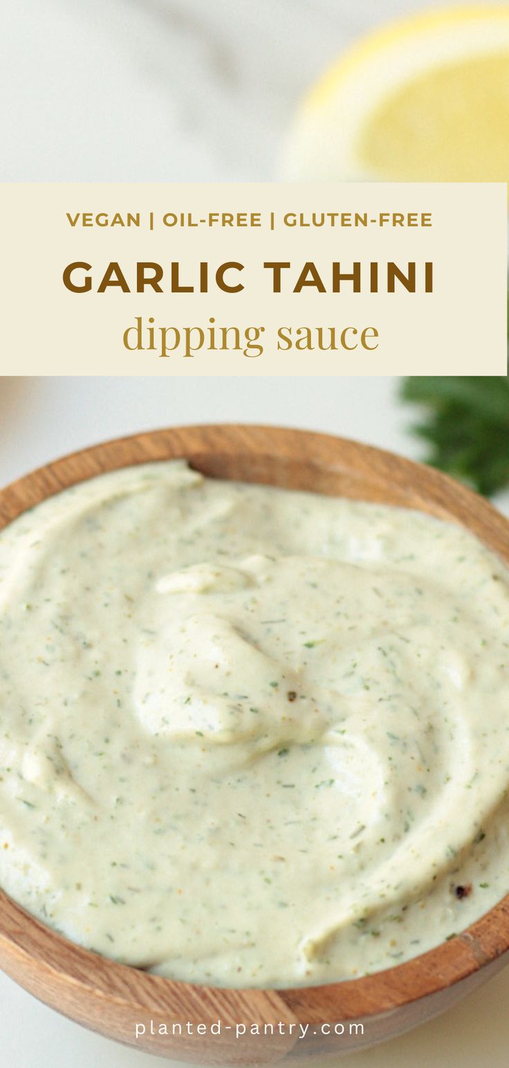 garlic tahini dipping sauce in a wooden bowl