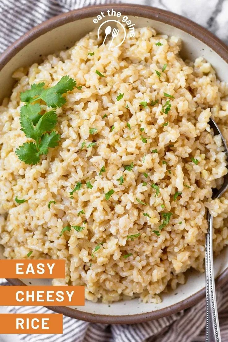 a bowl filled with brown rice and cilantro garnished with parsley