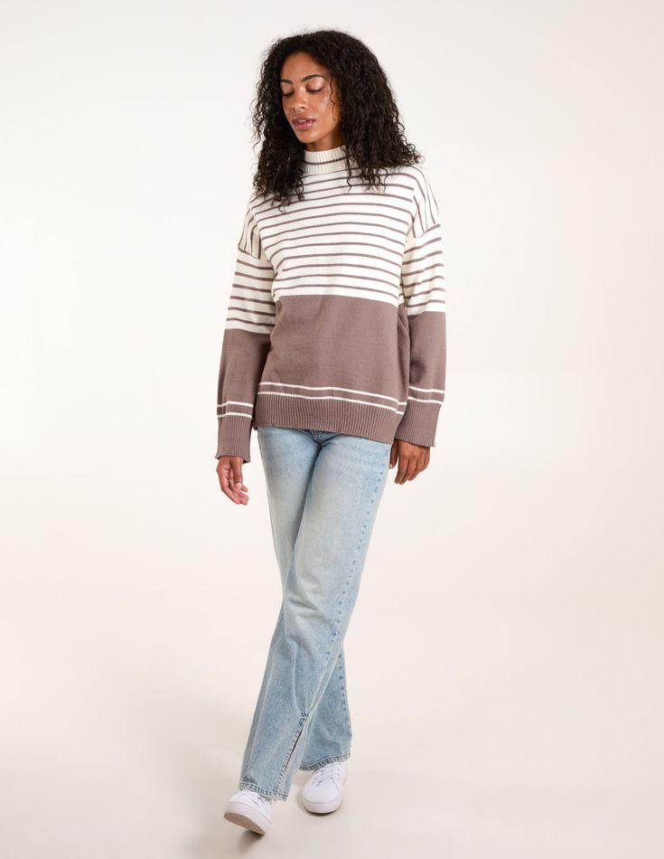 A fun option for those colder days ahead! This stripe jumper, is a cute fun option for you! Team with jeans and chunky boots, and PU jacket for the perfect Autumnal look! 44% Acrylic, 33% Polyester, 23% Polyamide Made In China Machine washableLong sleeve High neck Unfastened This item is a ONE size that fits UK 8-16 Model height: 5ft 11 / 180cm Casual Spring Sweater With Striped Hem, White Striped Hem Sweater For Fall, Trendy Contrast Stripe Sweater For Fall, Trendy Striped Outerwear For Layering, Fall Outerwear With Contrast Stripes, Cotton Sweater With Striped Hem For Fall, Cotton Sweater With Striped Hem For Winter, Trendy Fall Outerwear With Contrast Stripes, Fall Workwear Sweater With Striped Hem