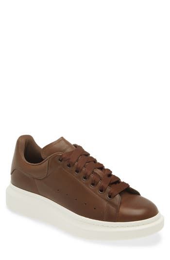 A chunky rubber platform elevates this lace-up sneaker with a removable, padded insole that provides signature comfort. 1 1/2" heel, 38mm (size 43MI) Lace-up style Removable, cushioned insole Leather upper/textile and leather lining/rubber sole Made in Italy Designer Shoes Medium Fit Platform Sneakers With Round Toe For Streetwear, Medium Fit Round Toe Platform Sneakers For Streetwear, Luxury High-top Chunky Sneakers With Rubber Sole, Luxury Leather Chunky Sneakers For Streetwear, Classic Sneakers With Lug Sole And Round Toe, Luxury Chunky Sneakers With Contrast Sole And Lace-up, Classic Platform Sneakers With White Sole For Streetwear, Platform Sneakers With Branded Insole And Round Toe, Luxury Chunky Lace-up Sneakers With Contrast Sole