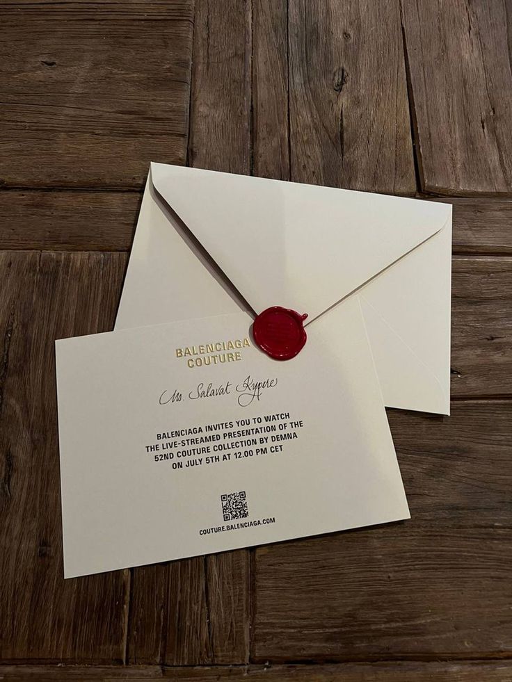 an envelope with a wax stamp on it