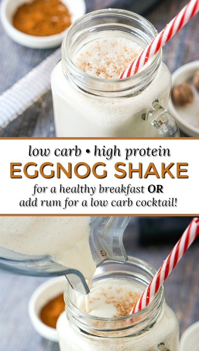 an eggnog shake in a mason jar with two striped straws