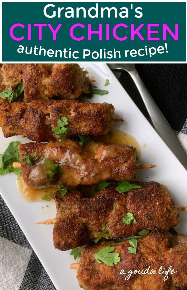 chicken skewers on a white plate with text grandma's city chicken authentic polish recipe