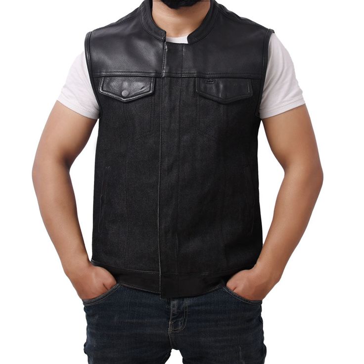 Gaius features YYK hardware and cowhide leather on accents and shoulders. Its interior is unlined. The overall look of the vest is remarkable in every way possible. Pair it with a buttoned-down checkered shirt and black cotton jeans with suede boots. Features: 14oz Rough Neck Raw Denim torso Club style vest with one-inch preacher collar and covered snaps Hidden zipper Interior concealed carry pocket on the right side Quick access concealed carry pocket on the left side Two buttoned chest pockets Rugged Leather Vest Outerwear, Leather Vest For Streetwear In Fall, Leather Vest For Fall Streetwear, Fall Streetwear Leather Vest, Leather Vest With Pockets For Fall, Leather Workwear Vest With Pockets, Leather Work Vest With Pockets, Leather Vest With Pockets For Work, Fitted Leather Vest For Streetwear