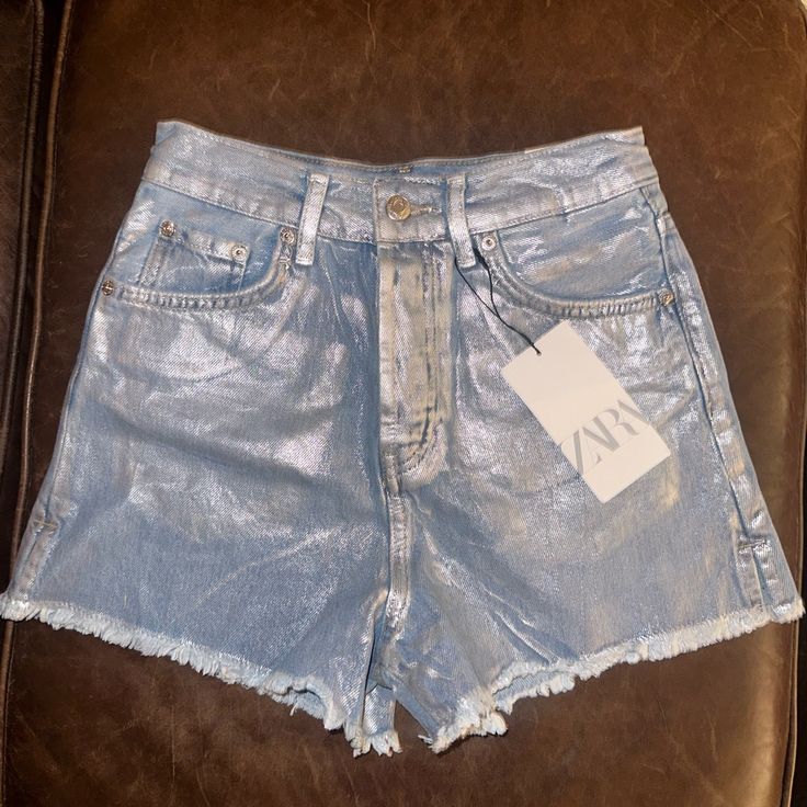 Nwt Denim Material With Painted Silver On Top Trendy High Rise Metallic Bottoms, Silver Casual Shorts For Spring, Casual Silver Bottoms Short Length, Casual Metallic Shorts For Spring, Trendy Silver Short Bottoms, Casual Silver Jeans, Trendy High Waist Silver Bottoms, Casual Metallic Jeans, Trendy Silver Shorts For Summer