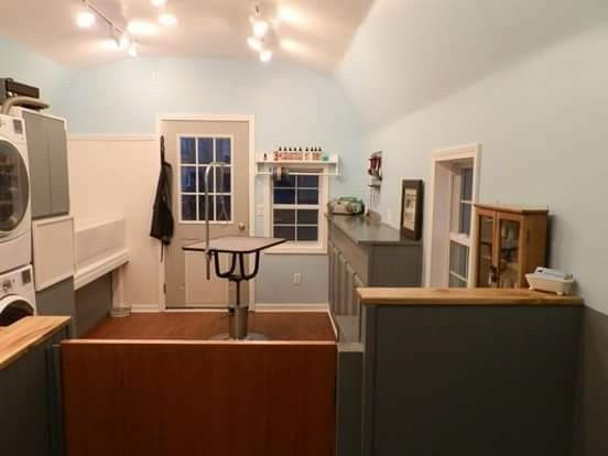 an image of a laundry room with washer and dryer