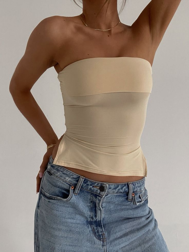 DETAILS: Our Nina Nude Tube Top, a wardrobe staple designed for both style and comfort. Crafted from soft fabric with ample stretch, this fitted tube top ensures a comfortable and flattering fit for all-day wear. Enhance your silhouette with the side ruching detail, which adds a touch of elegance and creates a flattering look. Versatile and chic, the Nina Nude Tube Top is perfect for layering or wearing on its own, making it a must-have piece for any fashion-forward wardrobe. CONTENT & CARE: 50% Tube Top Outfits, Fall 23, Women's Outfit Sets, Simple Fits, New Arrival Dress, Linen Clothes, Street Style Women, Tube Top, Date Night Outfit