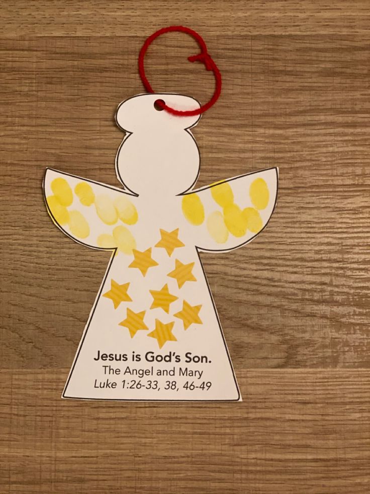 an angel ornament with the name jesus is god's son