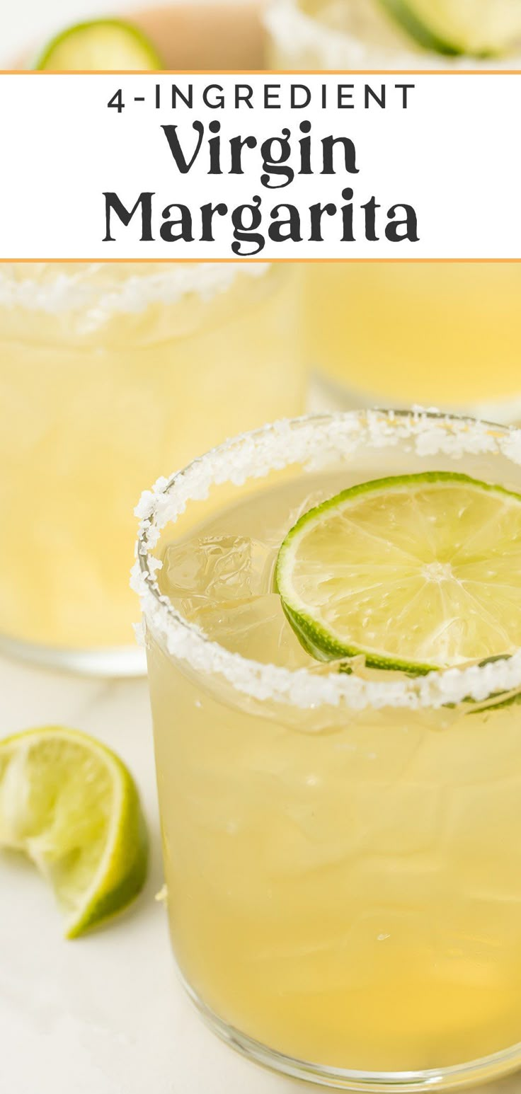 two margaritas with lime and salt garnish in them on a white surface