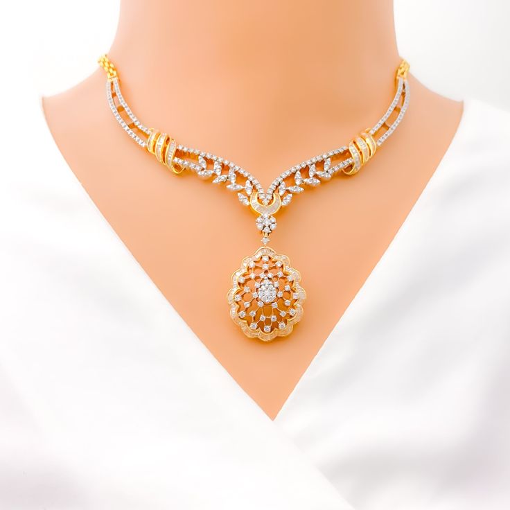 This exquisite 18k gold set, weighing 46.8 grams, features an extravagant floral vine design adorned with dazzling diamonds. The yellow gold finish enhances its luxurious appeal, making it perfect for any special occasion. The set includes a necklace with a total diamond weight of 8.16 carats, featuring F-G color and VS quality diamonds in round and baguette shapes. The necklace has a length of 16.5 inches with a 1.5-inch drop length, adjustable 0.75-inch links, and a secure hook lock. The match Opulent Formal Necklace With Elegant Design, Elegant Gold Plated Filigree Jewelry Sets, Elegant Gold-plated Filigree Jewelry Sets, Formal Yellow Gold Hand-set Necklace, Formal Yellow Gold Hand Set Necklace, Formal Hand Set Yellow Gold Necklace, Elegant Hand Set Bridal Necklace For Reception, Elegant Bridal Necklace Hand Set For Reception, Luxury Bridal Necklace With Elegant Design For Formal Events