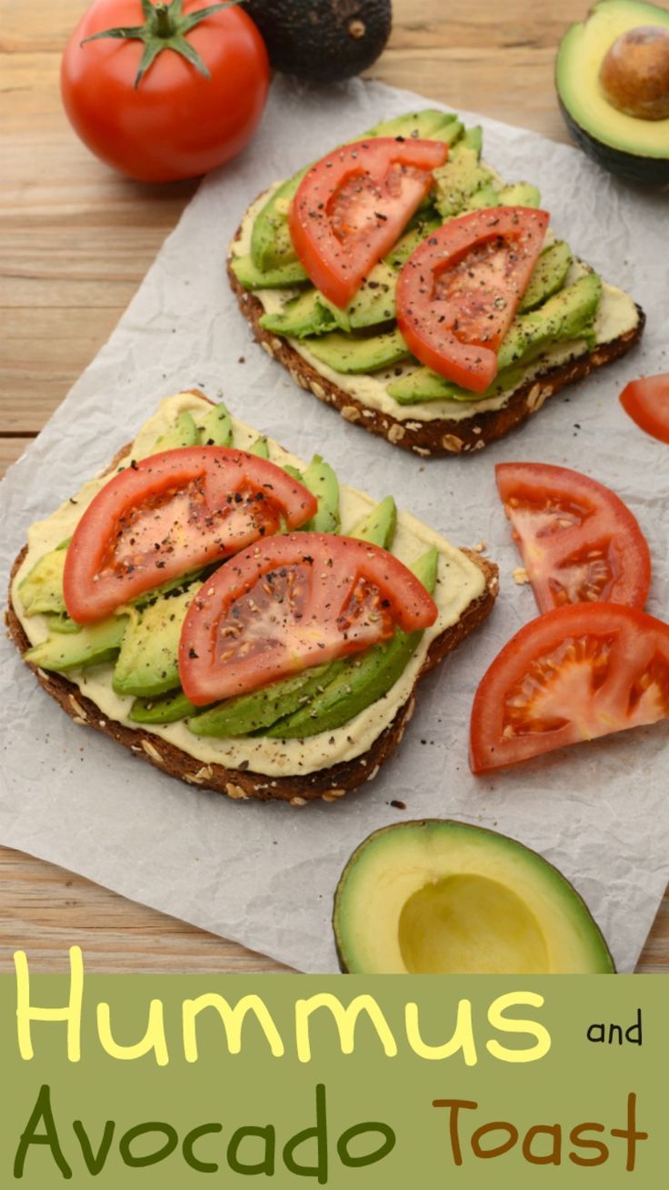 an avocado toast with tomatoes, lettuce and tomato slices on it