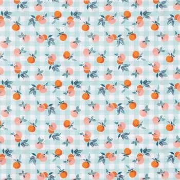 an orange and blue checkered fabric with small leaves on it's sides,