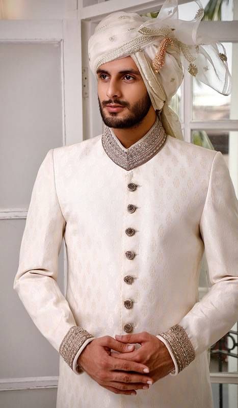 Classic Long Sleeve Traditional Formal Wear, Classic Long Sleeve Festive Traditional Wear, Classic Unstitched Traditional Wear For Formal Occasions, Classic Fitted Kurta For Festive Occasions, Festive Long Sleeve Traditional Fit Sherwani, White Dabka Sherwani Traditional Fit, Traditional Fit Sherwani For Wedding And Diwali, Traditional Fit Bandhgala For Wedding, Classic Bandhgala For Eid Festivities