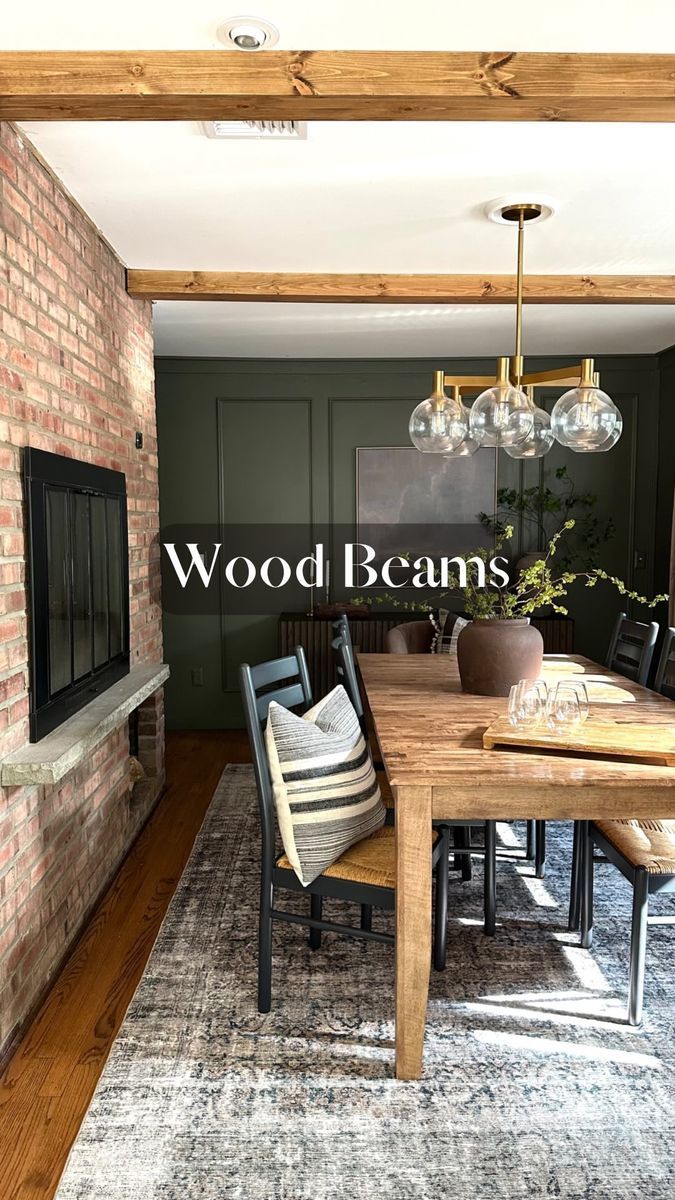 a dining room table and chairs in front of a brick wall with the words wood beams above it