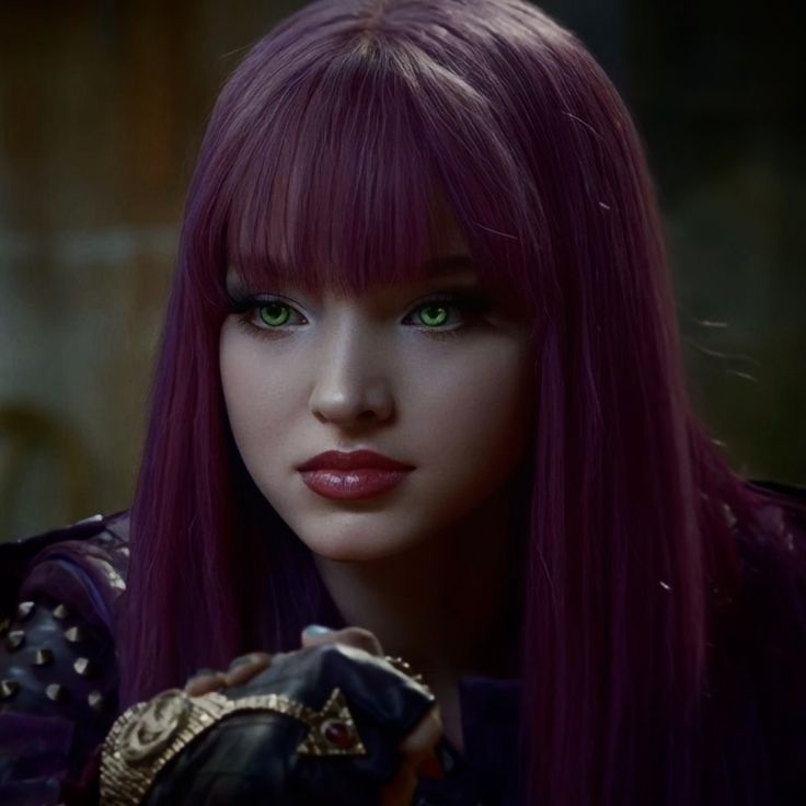 a woman with purple hair and green eyes holding a glove in her hand while looking at the camera