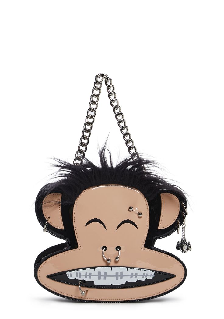 This Julius shaped bag has a patent vegan leather construction, embroidered face details, faux fur hair on top, pierced appliques, one ear has a metal bat charm, a checkered print lining, detachable chain link and studded top handles, and a top zipper closure with a vinyl heart shaped Skurvy skull graphic charm. Body Jewelry Diy, Stud Outfits, Metal Bat, Dope Jewelry Accessories, Face Details, My Style Bags, Cute Clothing Stores, Bags Pink, Embroidered Face