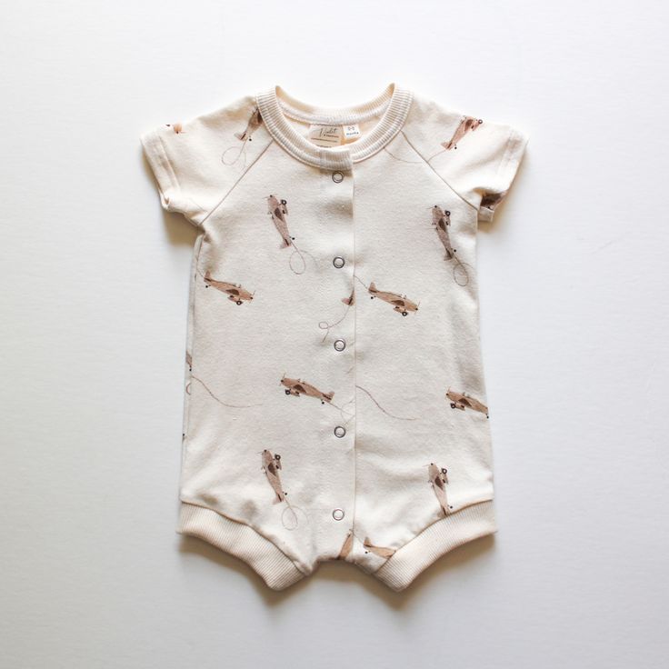 Hemlock Romper - Airplane – Violet and Hawthorn Casual Short Sleeve Bodysuit For Spring Playtime, Organic Cotton Short Sleeve Onesie For Playwear, Unisex Cotton Onesie For Loungewear, Organic Cotton Playwear Onesie, Short Sleeve Onesie For Summer Loungewear, Unisex Casual Short Sleeve Bodysuit For Playwear, Casual Cotton Bodysuit For Playtime, Casual Short Sleeve Bodysuit For Playwear, Unisex Casual Onesie For Playwear