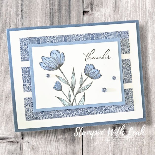 a card with blue flowers on it and the words thanks written in cursive writing