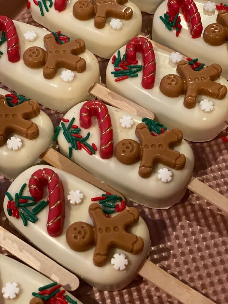 many decorated cookies sitting on top of a table