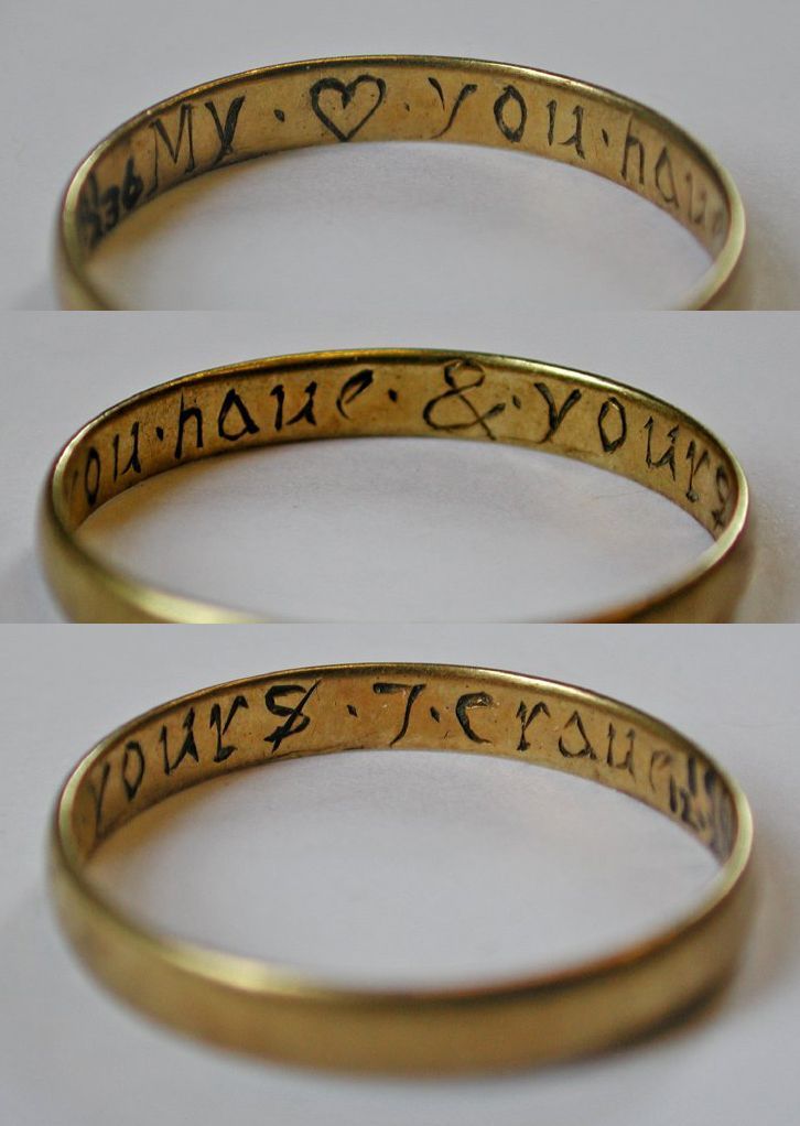 two gold wedding bands with words engraved on them, one is for my husband and the other is for me