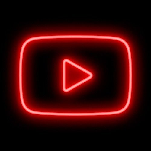 a red neon sign with an arrow in the center on a black background that says youtube