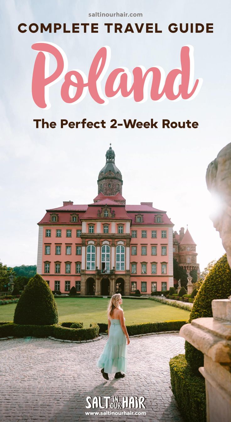 a woman standing in front of a pink building with the words, complete travel guide poland