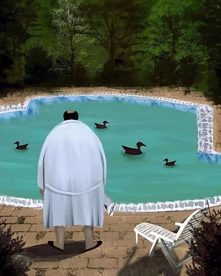 a man standing in front of a swimming pool surrounded by ducks