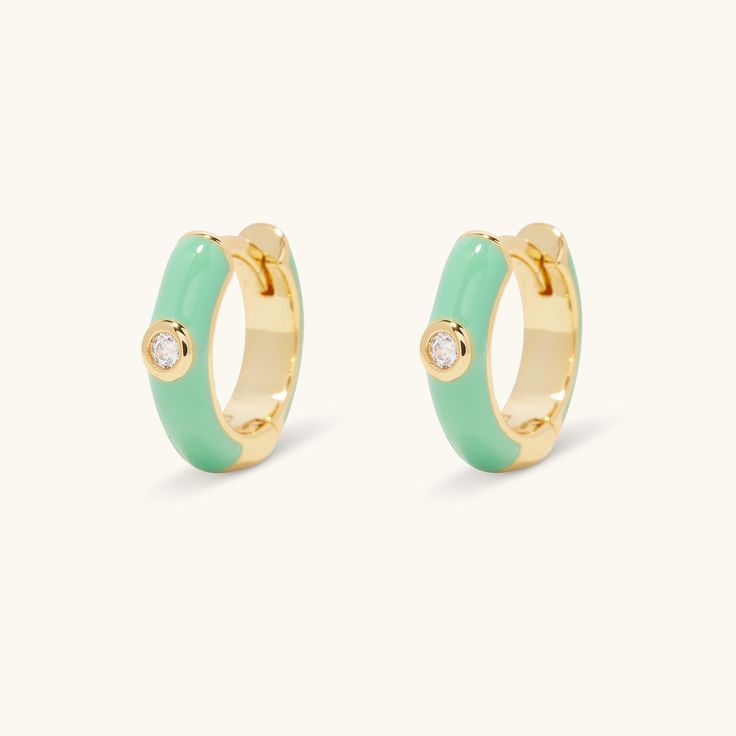 Features: 18k gold plated Size: 12mm Tiny CZ stone Hinge closure Gold Round Huggie Earrings With Gemstone, Ear Party, Plate Size, Accessories Rings, White Enamel, Cz Stone, High Quality Jewelry, Layered Necklaces, Anklets