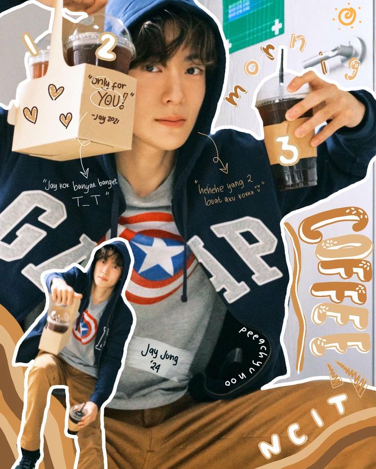 an image of a man holding two cups with coffee in it and some paper stickers on the wall behind him