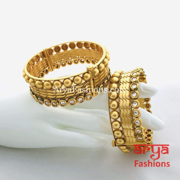 Golden Rajwadi Kundan Bracelet Bangles Features: Made in Brass with 22 Karat Gold polish Pair of 2 Bangles Thickness: Approx. 0.75 Inches Available in size 2.6 Openable Bangles Gold Kangan, Ruby Bangles, Kundan Bangles, Bangles Indian, Bangles Making, Kundan Jewellery, American Diamond, Gold Polish, Pricing Jewelry