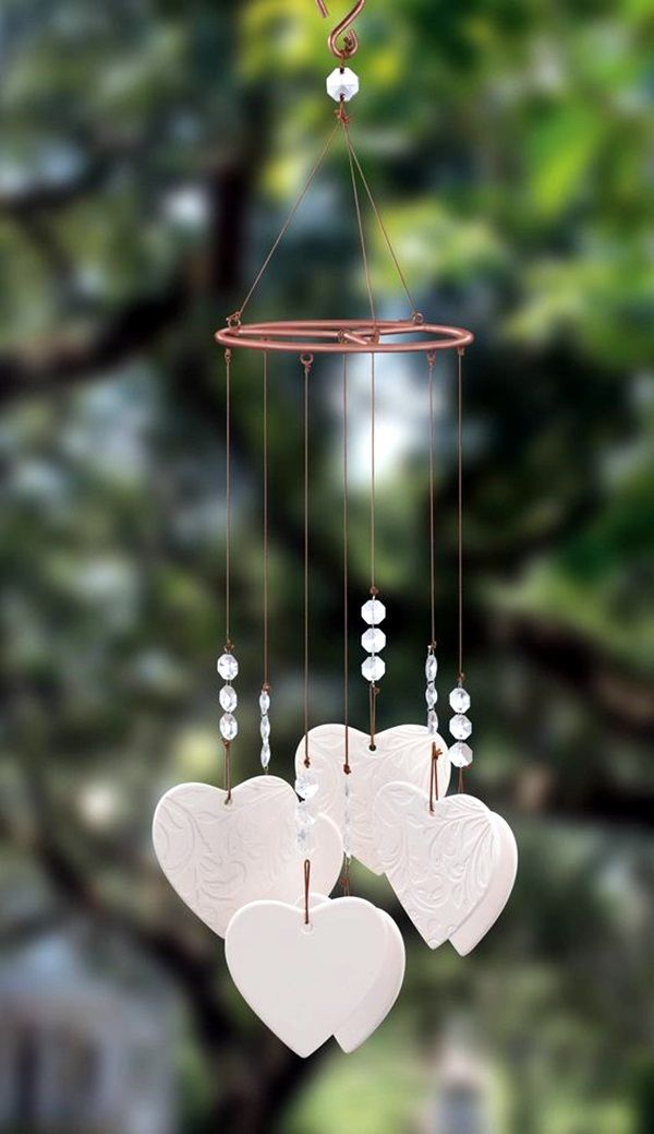 two hearts hanging from a wind chime