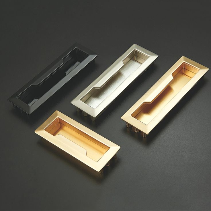 three different types of drawer pulls on a black surface with one open and the other closed