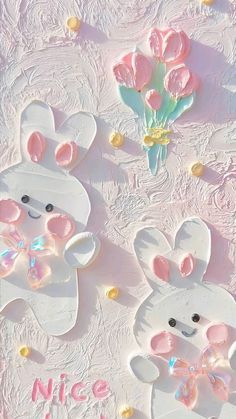 two white rabbits with pink bows on their ears and one bunny holding a flower in it's mouth