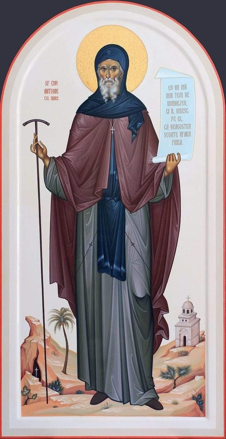 an icon of st john the baptist, who is holding a staff in his hand