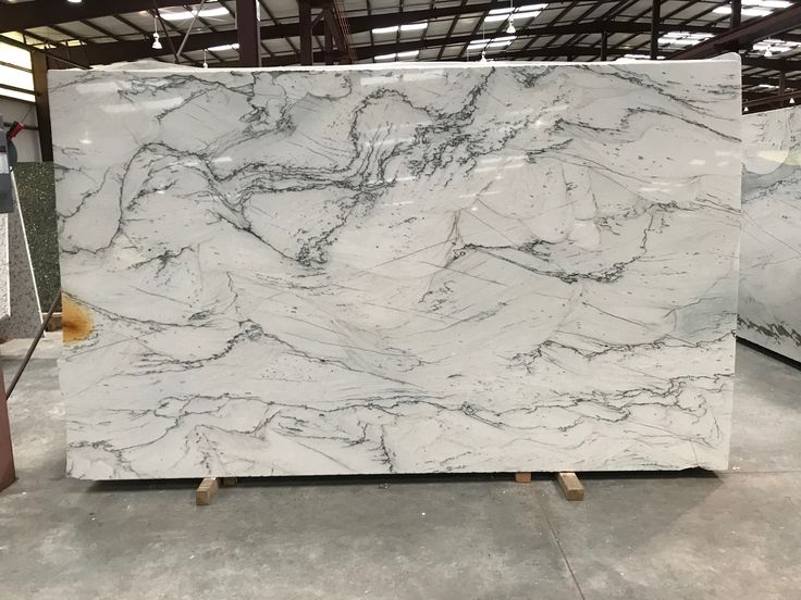 a marble slab is being displayed in a warehouse