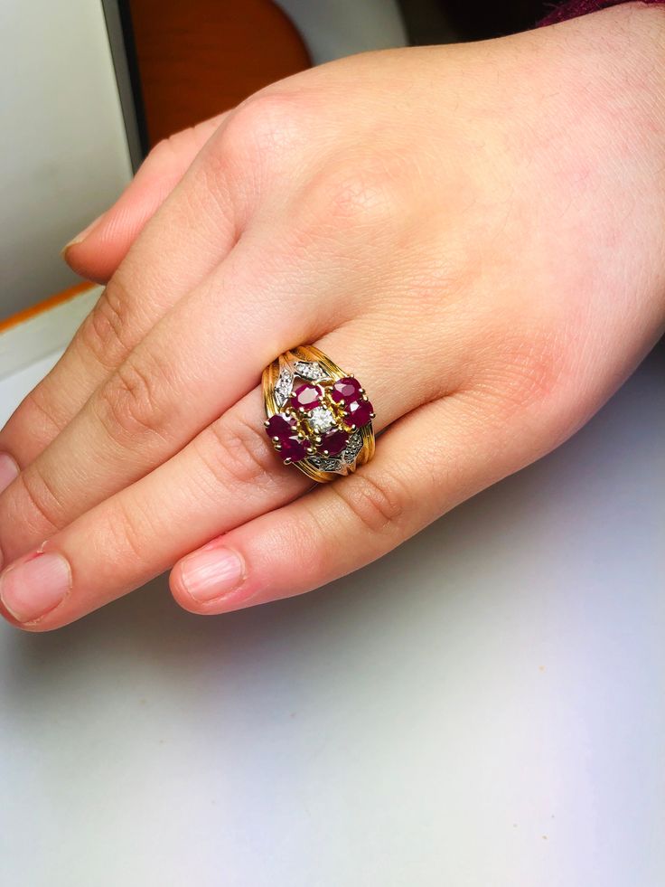 Gorgeous Vintage 14k Yellow Gold Diamond and Natural Ruby Ring: Diamonds: 0.25CT Color: G-I Clarity: SI1-SI2 Ruby: 1.80 CT Total ring weight: 5.8 GR 14K Yellow Gold Ring sizing available free of charge For more information regarding this item feel free to reach me so I can accommodate your needs. Thank you Exquisite Yellow Gold Cluster Diamond Ring, Dazzling Yellow Gold Rings, Cluster Yellow Gold Hallmarked Rings, Yellow Gold Cluster Rings Hallmarked, Yellow Gold Cluster Ring In Fine Jewelry Style, Yellow Gold Cluster Ring With Hallmark, Fine Jewelry Yellow Gold Cluster Diamond Ring, 14k Gold Cluster Diamond Ring Fine Jewelry, Cluster Yellow Gold Rings Stamped 14k