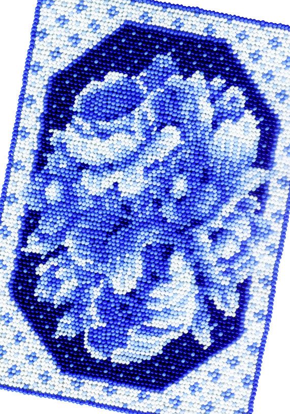 a blue and white square with flowers on it's border, in the center