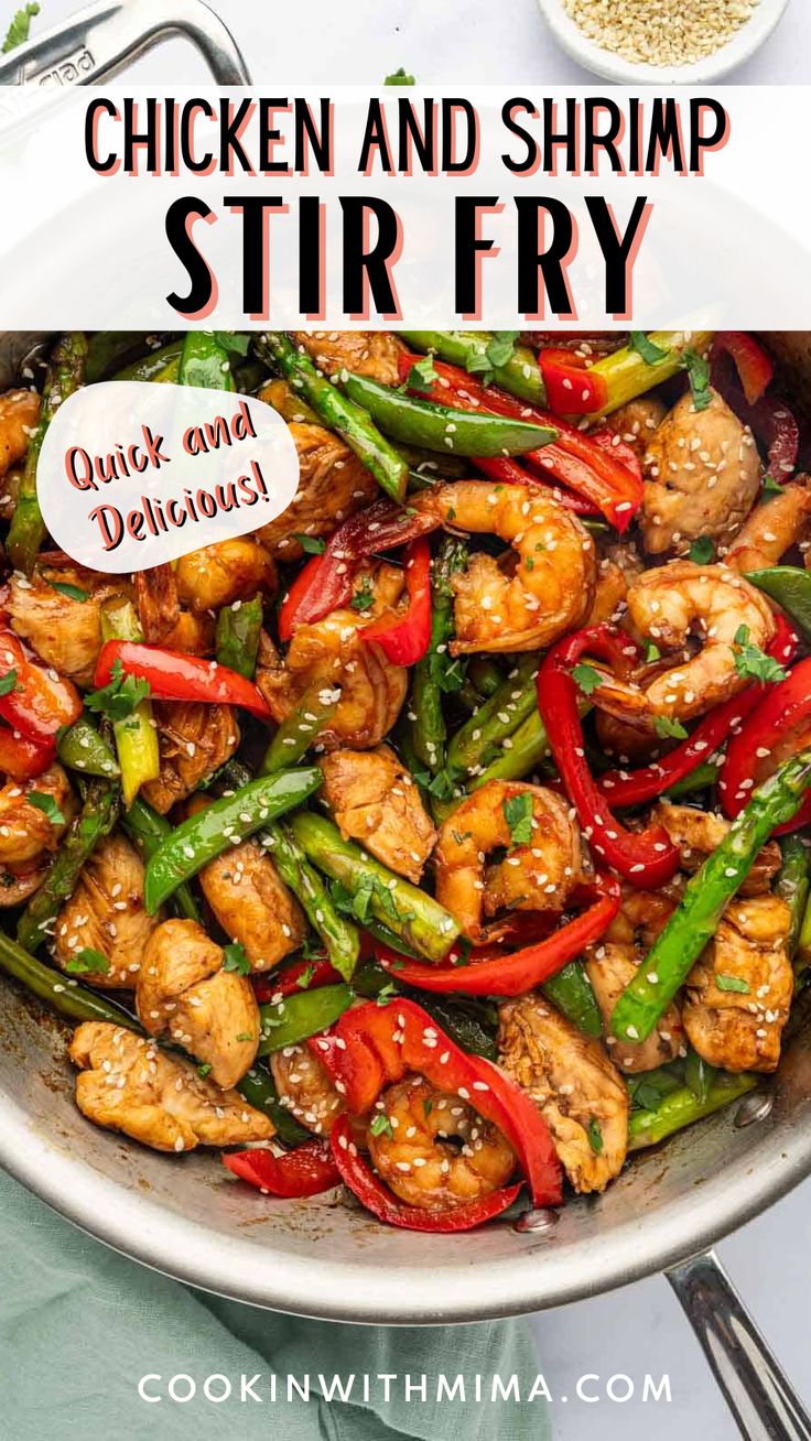 chicken and shrimp stir fry in a skillet with red peppers, green beans and sesame seeds