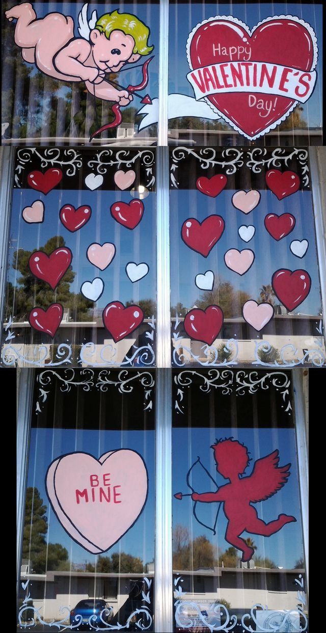 valentine's day window stickers on the side of a building