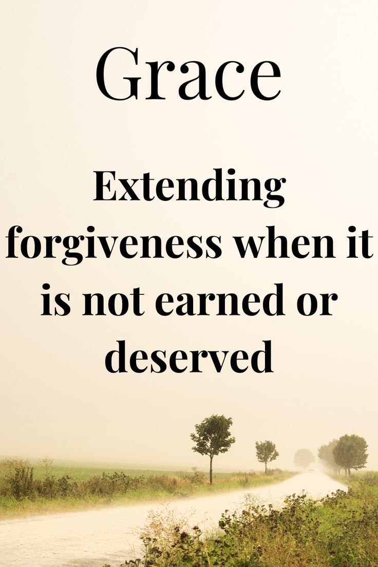 a road with trees and grass in the background that says grace extending forgingness when it is not earning or deserved