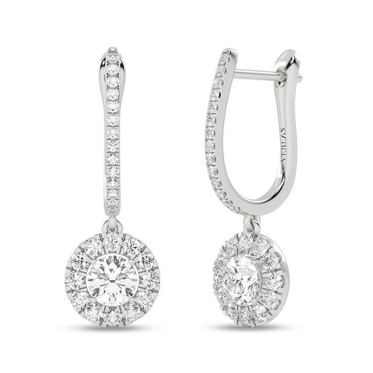 Elevate your style with these captivating Round Halo Drop Earrings. The round center diamond is surrounded by a halo of smaller diamonds, creating a dazzling display of brilliance. Crafted in solid gold, these earrings are a testament to Verlas' commitment to craftsmanship. Timeless Round Cluster Earrings With Brilliant Cut, Classic Diamond Bridal Earrings With Halo Setting, Classic Bridal Earrings With Halo Setting Diamond, Timeless Round Brilliant Cut Cluster Earrings, Dazzling Diamond Halo Earrings, Classic Cluster Halo Diamond Earrings, Halo Diamond Earrings For Formal Occasions, Formal Round Halo Diamond Earrings, Formal Diamond Halo Earrings