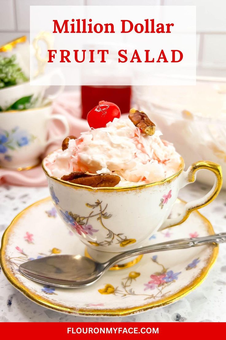 a bowl filled with fruit salad on top of a plate next to a cup and saucer