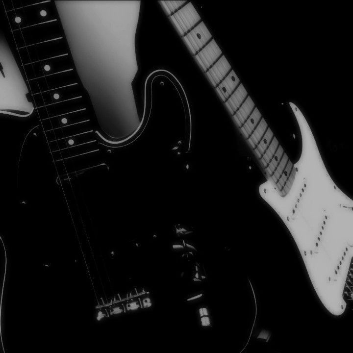 black and white photograph of an electric guitar