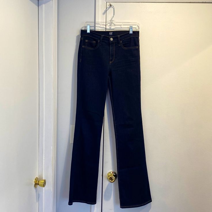 Very Gently-Worn Once And In Excellent, Almost Brand New Condition. This Is A Size 27 Long For Taller Women. Fall Denim Bottoms By Gap, Gap Dark Wash Wide Leg Bottoms, Gap Dark Wash Bottoms With Five Pockets, Gap Dark Wash Five-pocket Bottoms, Gap High Rise Denim Pants, Gap Mid-rise Jeans For Fall, Gap Straight Leg Dark Wash Bottoms, Gap Denim Pants In Medium Wash, Gap Medium Wash Denim Pants