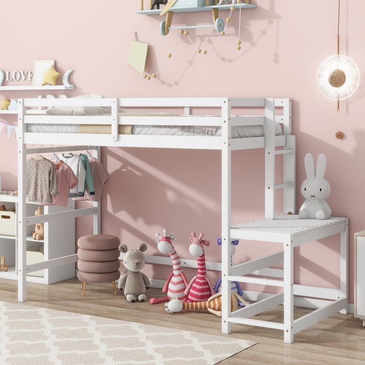 a child's bedroom with pink walls and white bunk beds, toys and decor