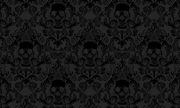 a black and white wallpaper with skulls in the middle, on a dark background