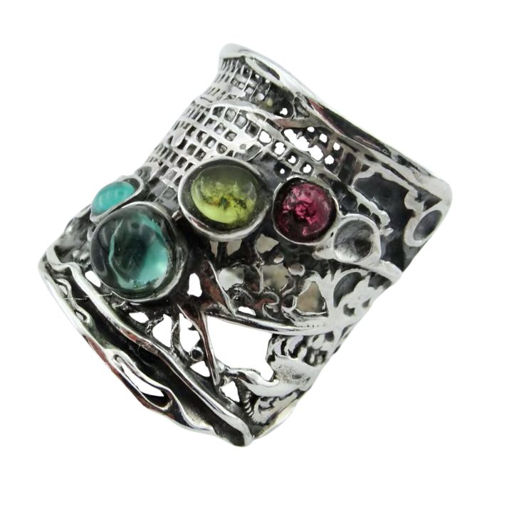 Wide Sterling Silver Ring With five genuine natural gemstones,Meticulously handcrafted in Israel for exceptional quality. Each piece is made to order with meticulous attention to detail.  MATERIAL & DIMENSIONS Metal: Sterling silver  Gemstone: Tourmaline, Granet and Citrin Gemstones Height: Front Width: 24mm / 0.944in., Back width: 5mm / 0.196in. CUSTOMIZATIONS: Explore our 14K Gold option for a luxurious upgrade.  Available in other gemstones for personalized style. RING SIZE: Custom-made to yo Multi Gem Ring, Red Garnet Ring, Gem Ring, Wide Rings, Garnet Ring, Tourmaline Ring, Unisex Ring, Garnet Rings, Multi Stone Ring