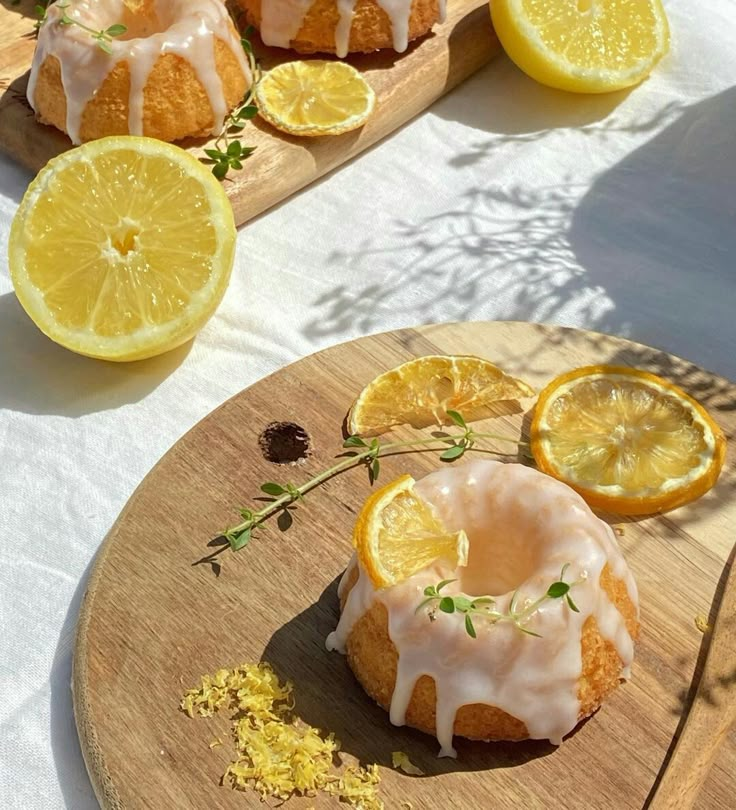 lemon bundt cake with icing on a wooden plate